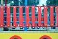 Colored structure in a playground with a red decorative fence Royalty Free Stock Photo