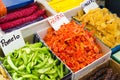 Colored sweet slices of candied fruit. Various dried fruits and eastern sweets on market Royalty Free Stock Photo