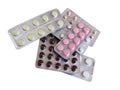 Colored tablets in packing isolated on a white background. Health,pain, disease, drugs