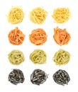 Colored tagliatelle pasta, twisted into nests, from above Royalty Free Stock Photo