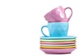 Colored tea cups and saucers Royalty Free Stock Photo