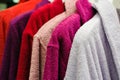 Colored terry bathrobes hanging on the store trempel Royalty Free Stock Photo