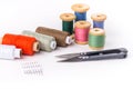 Colored thread with scissors on white background Royalty Free Stock Photo