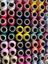 Colored threads in a reel, stack of sewing reels with high angle view Royalty Free Stock Photo