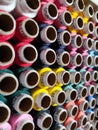 Colored threads in a reel, stack of sewing reels with high angle view Royalty Free Stock Photo