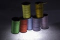 Colored threads for sewing. Skeins of colored threads on a black background Royalty Free Stock Photo