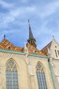 Colored tile roof of the famous Matthias Church in Budapest, Hungary. Roman Catholic church built in the Gothic style. Blue sky Royalty Free Stock Photo