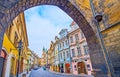 Mostecka Street through the arch of Mala Strana Bridge Tower of Charles Bridge, Prague, Czech Republic