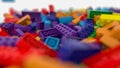 Colored toy bricks background. Rainbow colors. Random coloured plastic construction blocks. 3d illustration