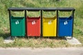 Colored trash containers in a park