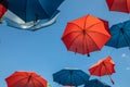 Colored umbrellas on the blue sky background Royalty Free Stock Photo
