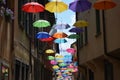 Colored umbrellas flying to other planets