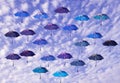 Colored umbrellas with sky background Royalty Free Stock Photo