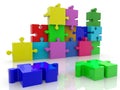 Colored unfinished puzzle wall on white Royalty Free Stock Photo