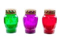 Colored votive candles on white background Royalty Free Stock Photo