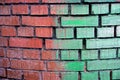 Red green texture of bricks in the wall of the house Royalty Free Stock Photo