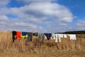 Colored washing on wire fence in africa Royalty Free Stock Photo