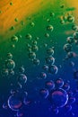 Colored water, air and oil mixed for a bubbly effect Royalty Free Stock Photo