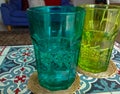 Colored water glasses on oriental coffee table