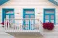 Colored window and balcony in typical small wooden house with colorful stripes in Costa Nova, Aveiro, Portugal. Detail of the Royalty Free Stock Photo