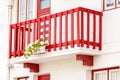 Colored window and balcony in typical small wooden house with colorful stripes in Costa Nova, Aveiro, Portugal. Detail of the Royalty Free Stock Photo