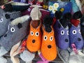 Colored winter felt slippers that seem heads of mouses in a market in Georgia.