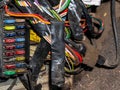 Colored wires and fuse box of the car`s internal electrical wiring