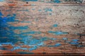 Colored wood background with peeling old paint Royalty Free Stock Photo