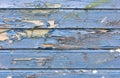 Colored wood background with peeling old paint Royalty Free Stock Photo