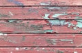 Colored wood background with peeling old paint Royalty Free Stock Photo