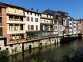 Colored wood houses on the Agout River of Castres in France.