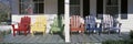Colored Wooden Chairs on porch Royalty Free Stock Photo