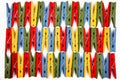 Colored wooden clothespins, isolated