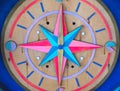 Colored wooden compass shows you the way Royalty Free Stock Photo