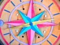 Colored wooden compass shows you the way Royalty Free Stock Photo