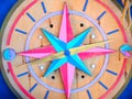 Colored wooden compass shows you the way Royalty Free Stock Photo