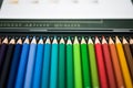 Colored wooden crayon set in the metall box, pencils Royalty Free Stock Photo