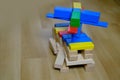 Colored wooden cubes, builds houses and rockets, the concept of the development of creativity, fine motor skills, patience and