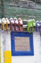 Colored wooden shoes on wall Royalty Free Stock Photo