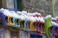 Colored wooden shoes on wall Royalty Free Stock Photo