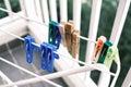 Colored and wooden vintage style clothspin