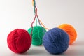 Colored wool knit balls placed on a Royalty Free Stock Photo