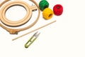 Colored yarn spools and a embroidery hook on a white background Royalty Free Stock Photo