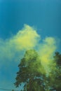 Colored yellow smoke from a smoke bomb