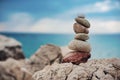 Colored zen stones at sea and sea