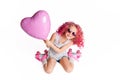 Colores Hairs. Portrait Of Funny Fashion Hipster Girl With Pink Ballon In The Shape Of Heart. Retro Camera In Her Hand