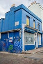 Colorful abandoned British shop on a street from Notting Hill