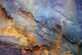 Colorful abstract background - closeup of blue and yellow layers of rock Royalty Free Stock Photo