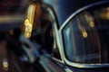 Close-up view vintage American auto details with bubble bokeh effect Royalty Free Stock Photo