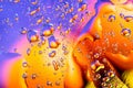 Colorful abstract background. Water drops rainbow colors on glass. Amazing abstract water drops on glass texture or background. Royalty Free Stock Photo